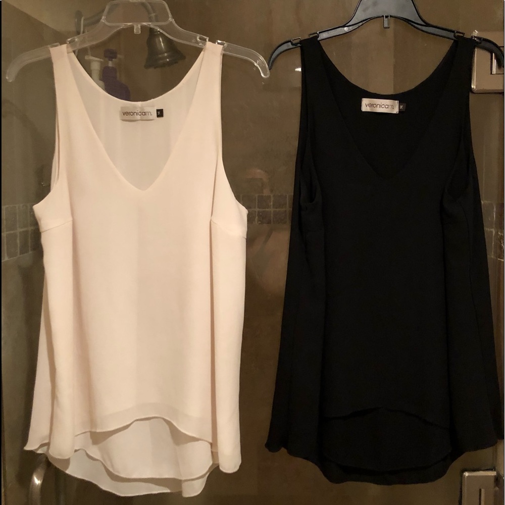 2 beautiful flowy dress tops